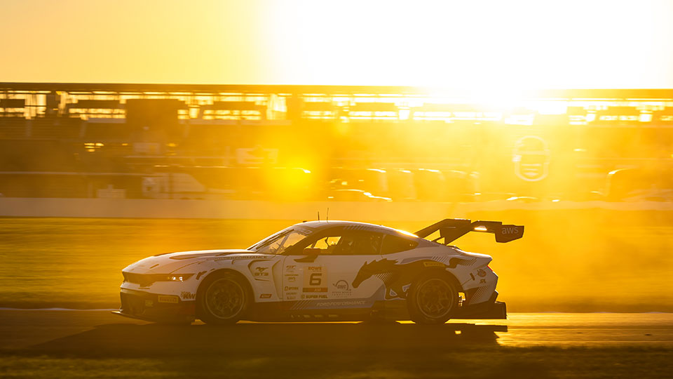 Cars race at the Indianapolis 8 Hour