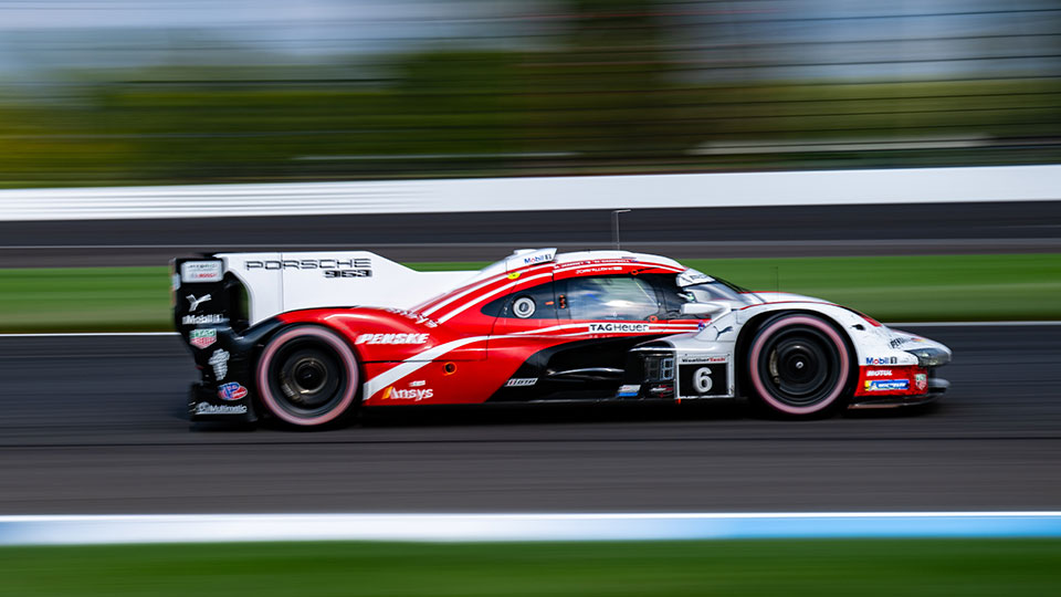 An IMSA Car drives